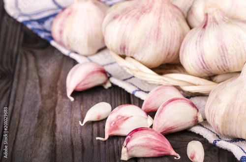 Garlic Cloves and Garlic Bulb on kitchen towel
