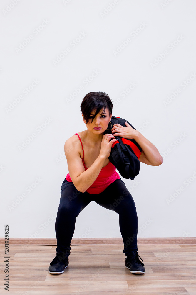 Naklejka premium Women exercising in a gym