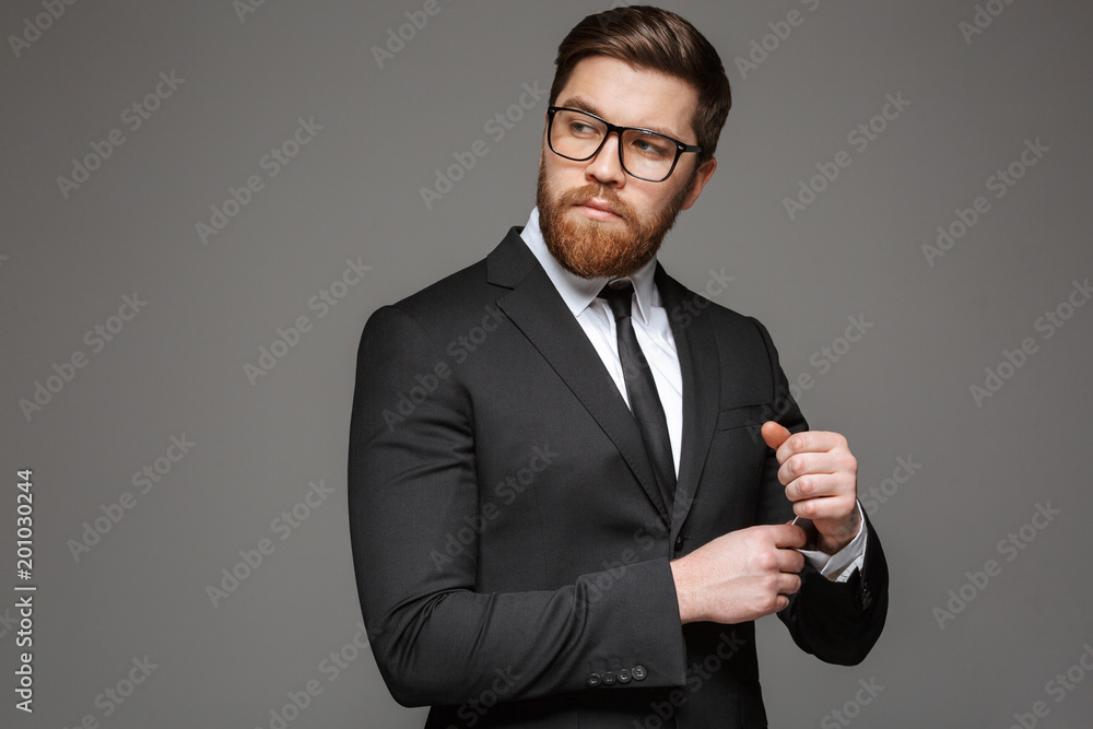 Portrait of a confident young businessman dressed in suit Portrait of a confident young businessman dressed in suit