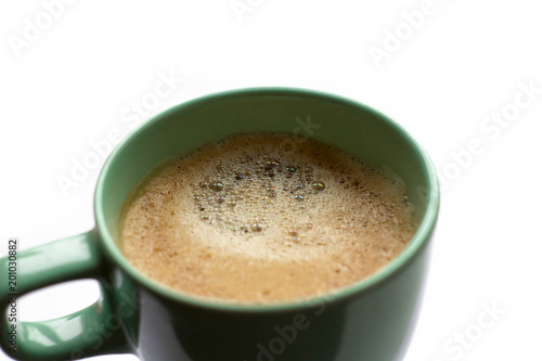 Close up green mug cup of coffee on a white background