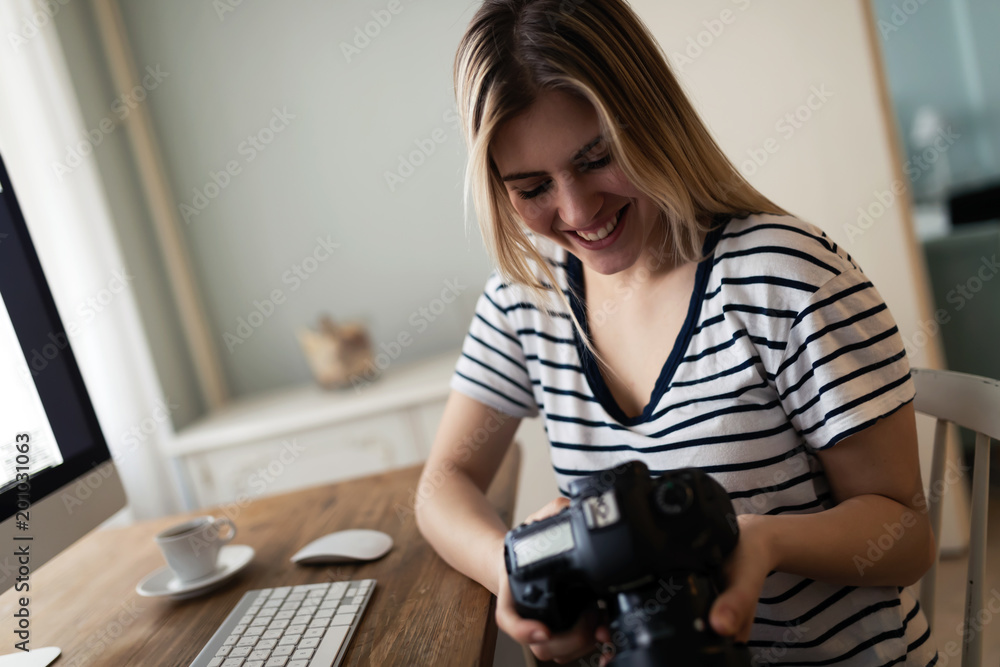 Portrait of young woman designing at home Portrait of young woman designing at home