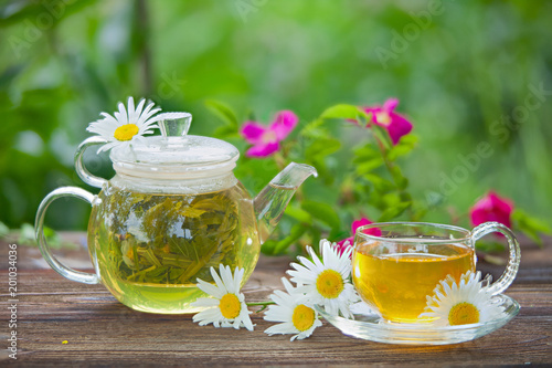 green tea with chamomile in cup