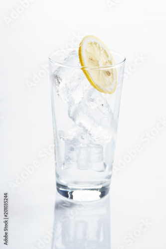 glass with ice and lemon