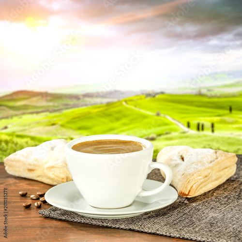 Coffee and tuscany landscape 