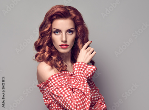 PinUp Portrait Beauty Redhead Girl.Curly hairstyle