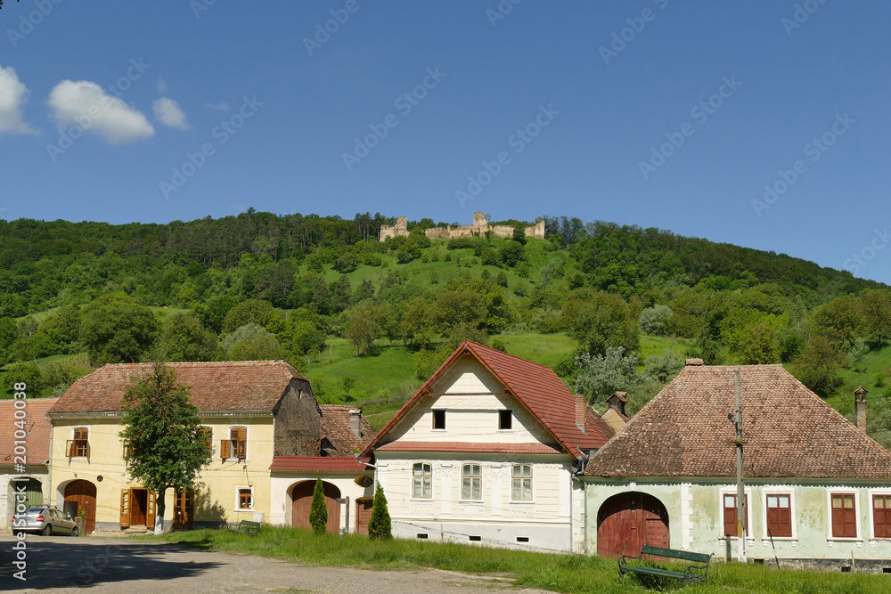Romania, houses in the village of Saschiz and the remains of the castle