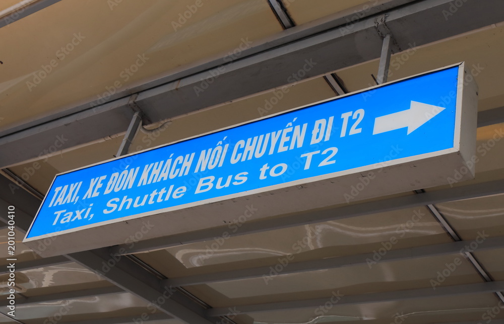 Hanoi International airport taxi and shuttle bus sign in Hanoi Vietnam Hanoi International airport taxi and shuttle bus sign in Hanoi Vietnam