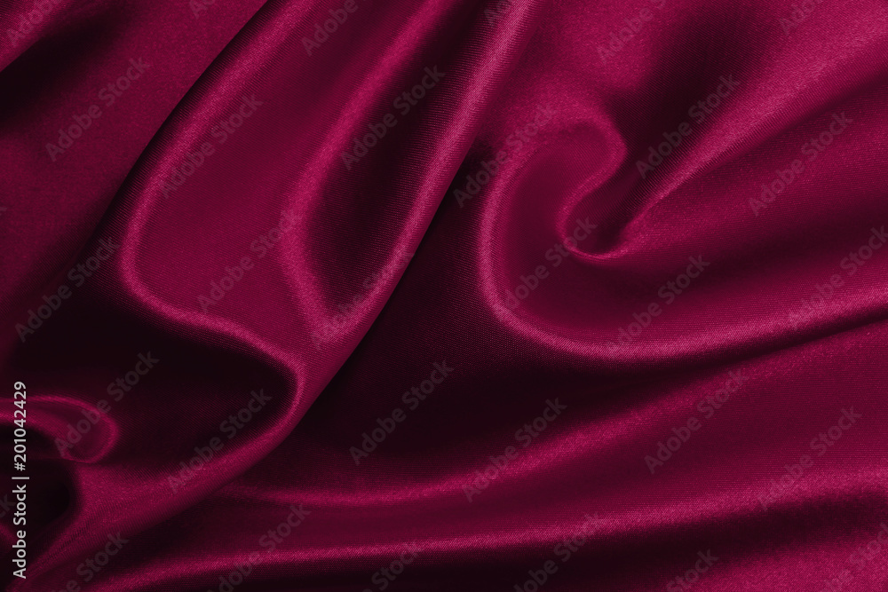 Obraz premium Smooth elegant pink silk or satin luxury cloth texture as abstract background. Luxurious valentines day background design