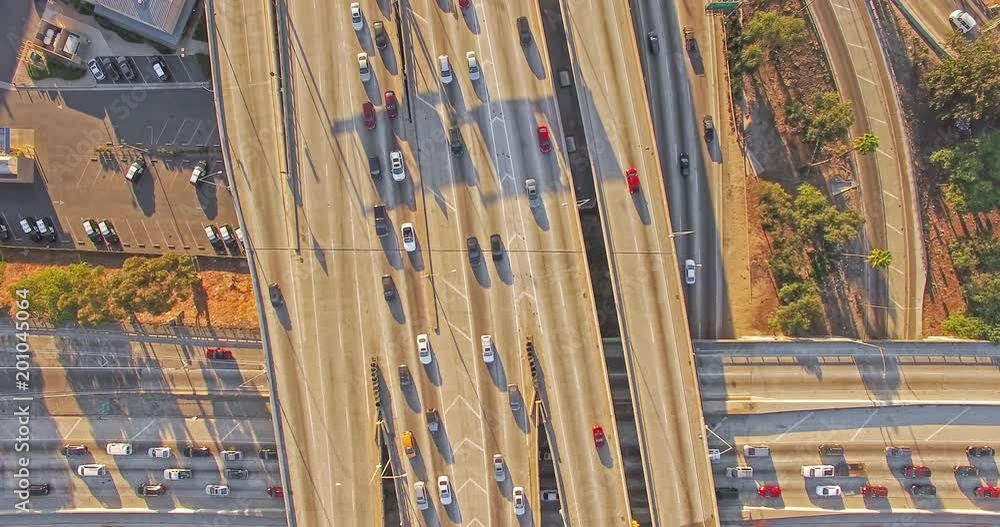 Aerial top down view of busy freeway interstate traffic Aerial top down view of busy freeway interstate traffic