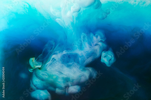 full frame image of mixing of blue, turquoise, black and white paints splashes  in water © LIGHTFIELD STUDIOS