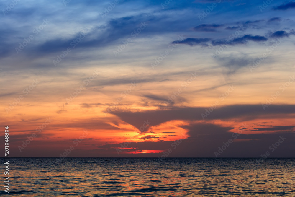 Fototapeta premium beauteous red sunset over ocean