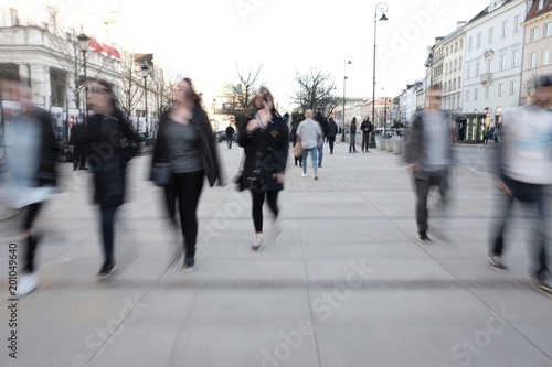blurry people  in the historic center of Warsaw