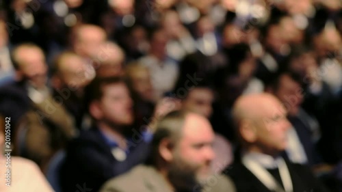 Wallpaper Mural Audience listens to the lecturer at the conference hall. Blurred Torontodigital.ca