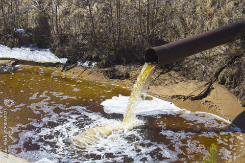 The Industrial Wastewater is Discharged from the Pipe