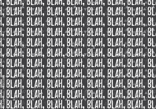 Blah, blah pattern on a simple triangles vector pattern on a dark gray background