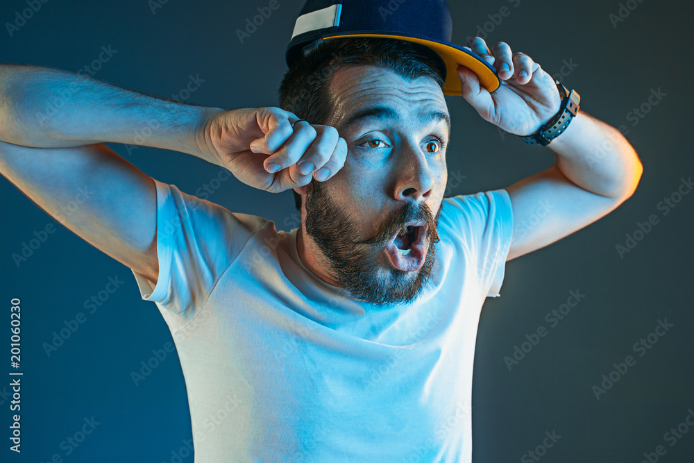 Φωτογραφία Sports, emotions and fan people concept - sad man watching sports on tv and supp
