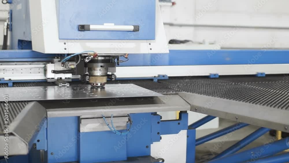 technology of metal perforation on the industrial conveyor. industrial automated machine technology of metal perforation on the industrial conveyor. industrial automated machine