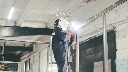 bright sparks and flares in electric welding in industrial production