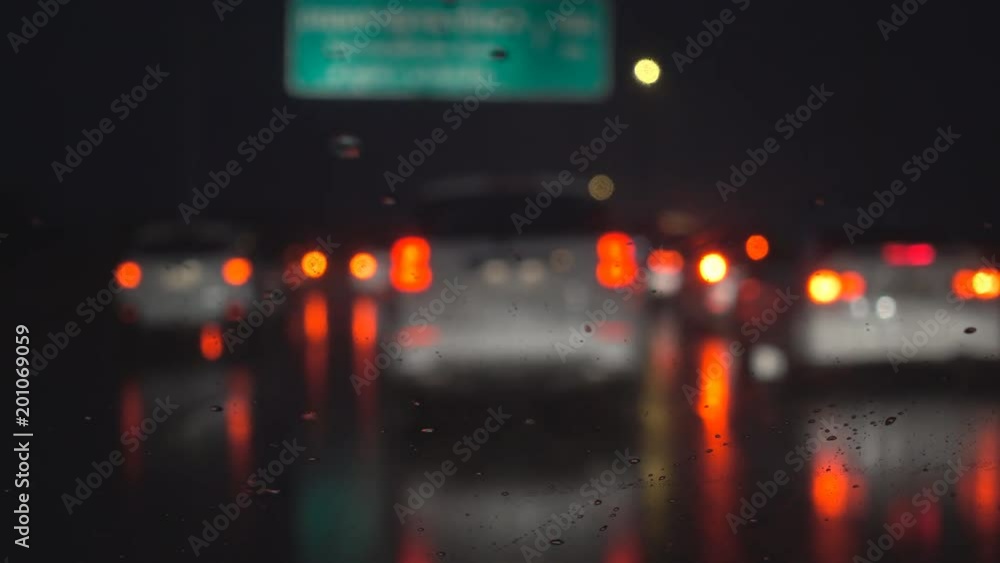 Driving in heavy rain, rack focus. Driving in heavy rain, rack focus.