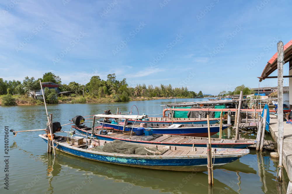 Traditional wooden boat in river at Chanthaburi, Thailand Traditional wooden boat in river at Chanthaburi, Thailand
