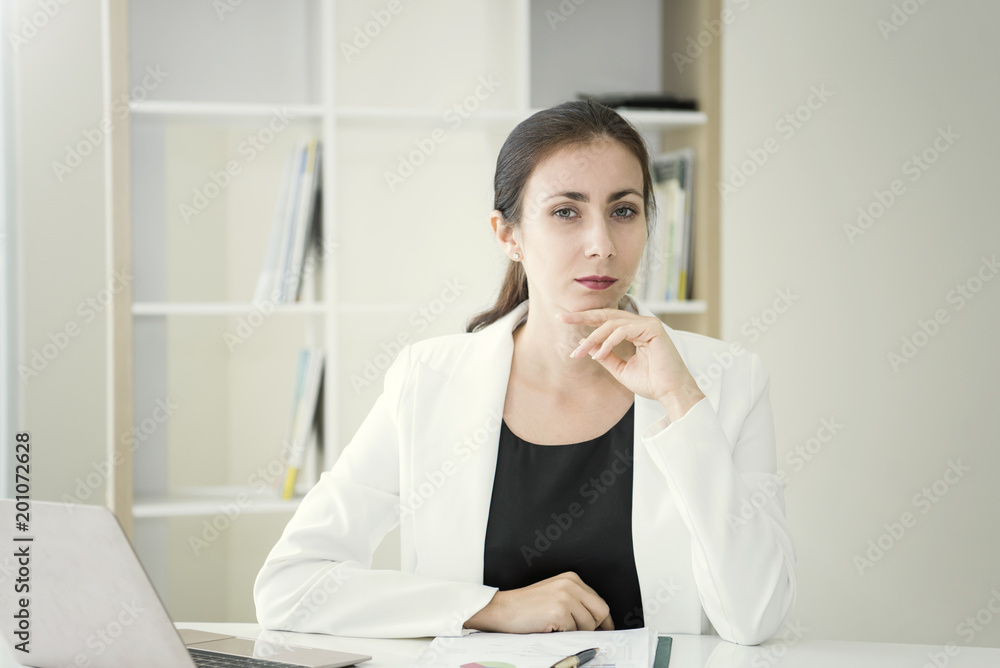 businesswoman thinking for work on desk at office. businesswoman thinking for work on desk at office.