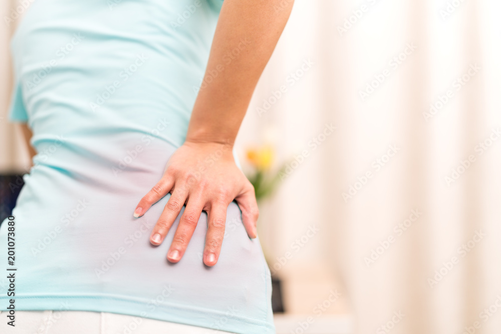 back pain at home. women suffer from backache. healthcare and medical concept back pain at home. women suffer from backache. healthcare and medical concept