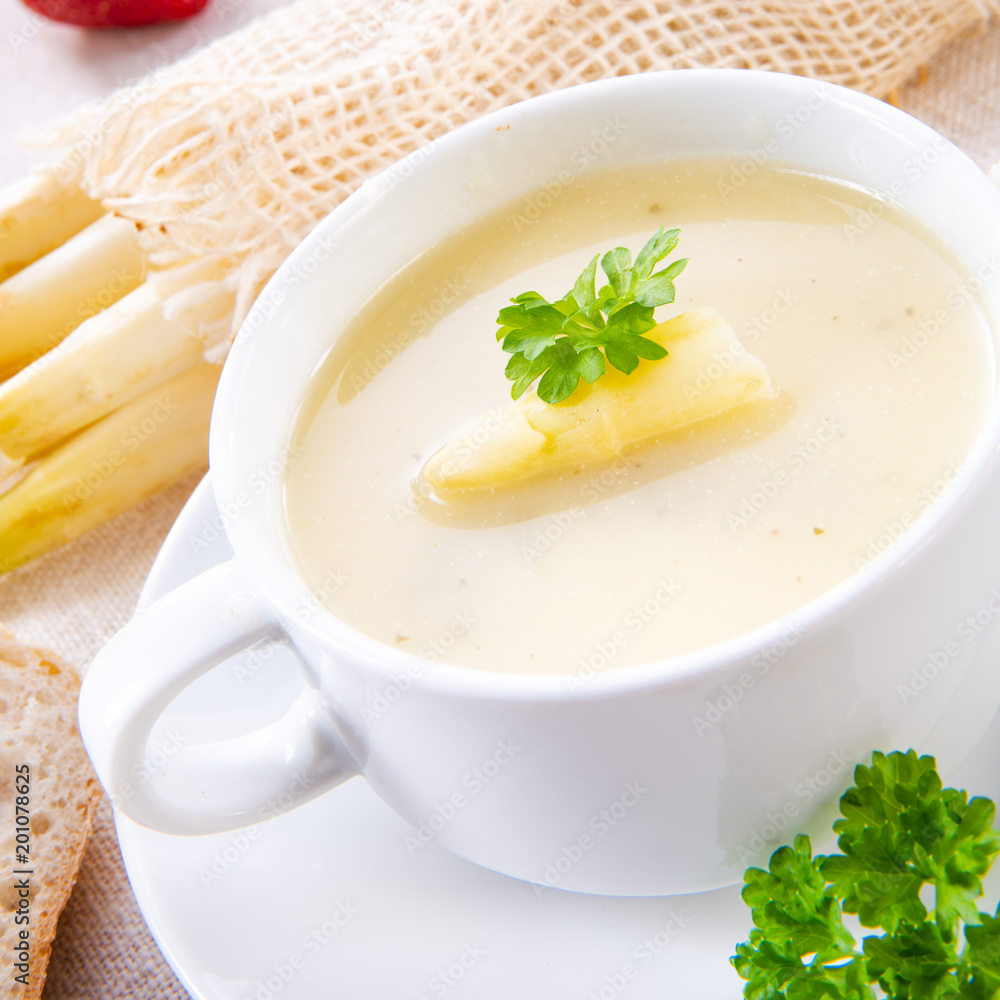 asparagus cream soup with capers and fresh baguette asparagus cream soup with capers and fresh baguette