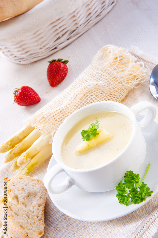 asparagus cream soup with capers and fresh baguette asparagus cream soup with capers and fresh baguette