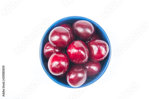 Fresh cherry on plate on Isolated white background. fresh ripe cherries. sweet cherries. Berries