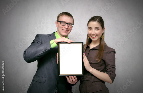 Awarding a diploma certificate to a best employee or student mock up. Winner award ceremony concept. One person handing a blank diploma with copy space to another person. Best worker or student. photo