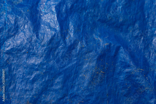 Background texture of blue plastic tarp photo