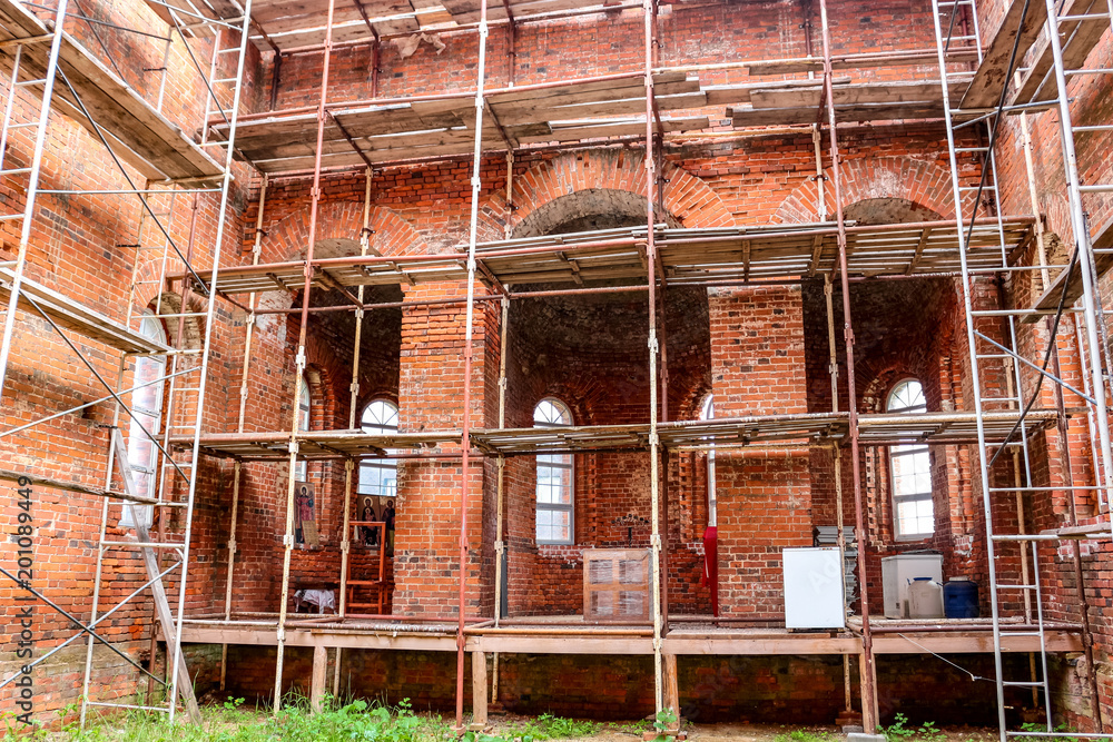 Trehsvyatskoe, Russia - May 2016: Temple in honor of the martyrs Guria, Samon and Aviv beginning of XX century. View of the altar during the reconstruction