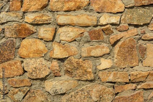 Brown stone wall. Background