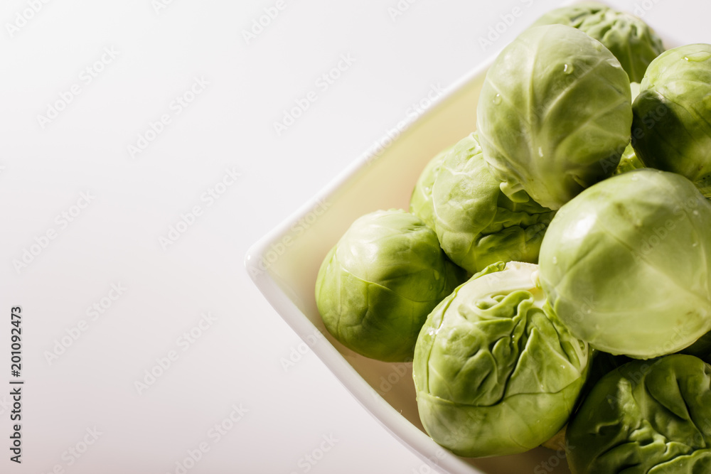 Brussels sprouts on a rustic wooden background Brussels sprouts on a rustic wooden background