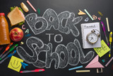 Back to school, the inscription with white chalk on a black school board, with breakfast and chancellery