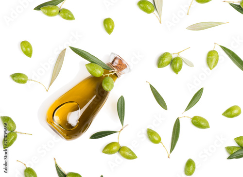 Fresh olives and olive oil, above view.