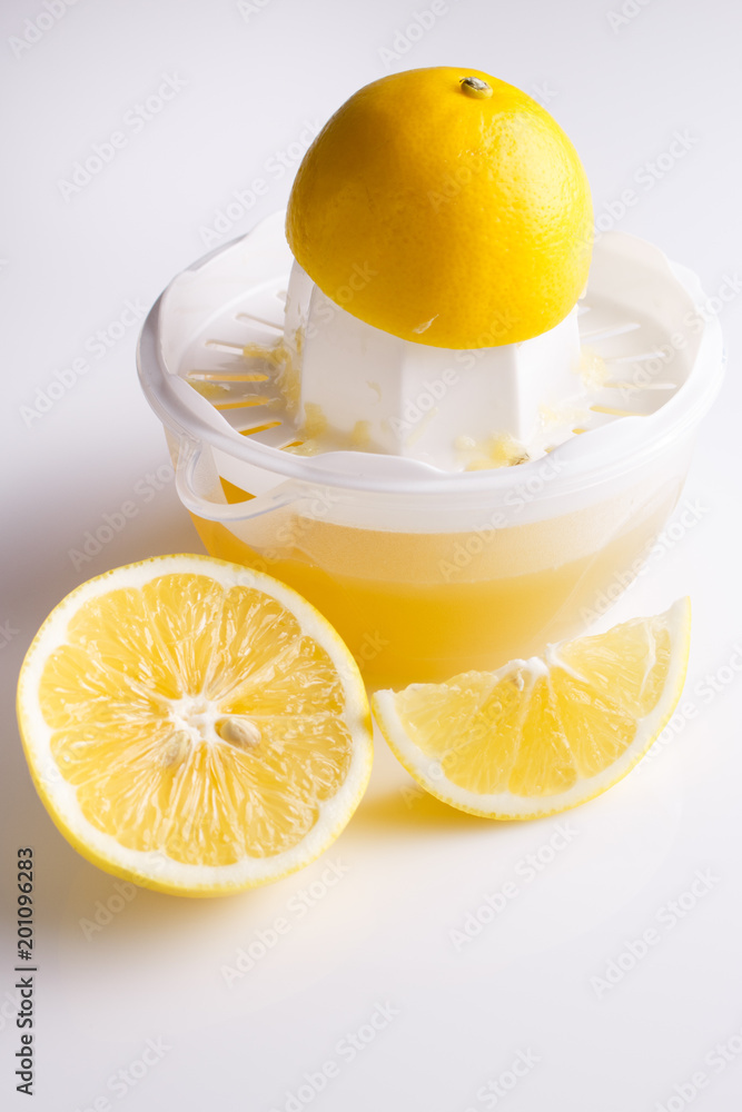 Lemon and juice on a white background Lemon and juice on a white background