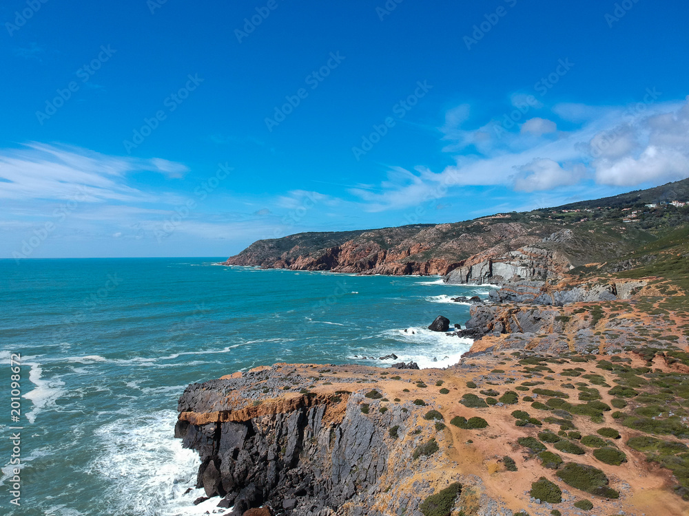 Aerial view from the Portuguese coastline with the ocean and the sintra mountains in background. Cascais Portugal