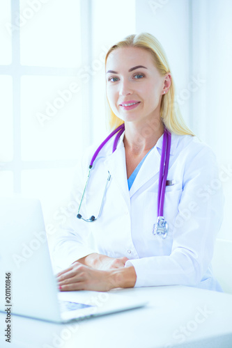 portrait of a young female doctor in a medical office
