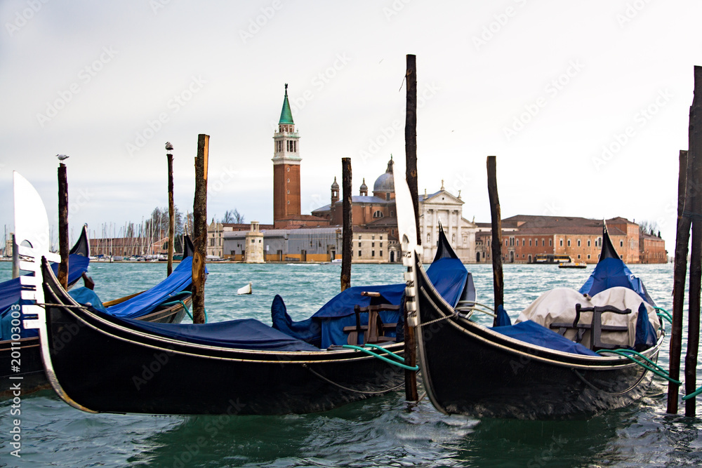 Gondolas mooring line in front of San Marco Plaza. Venice, Italy