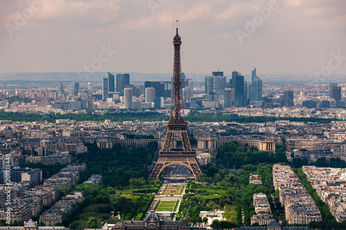 Eiffel Tower, Champ de Mars and La Defense district as seen from above.