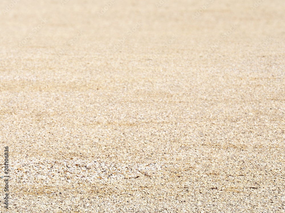 Soft selective focus, light crushed stone texture. Stone background, beige small granite gravel Soft selective focus, light crushed stone texture. Stone background, beige small granite gravel