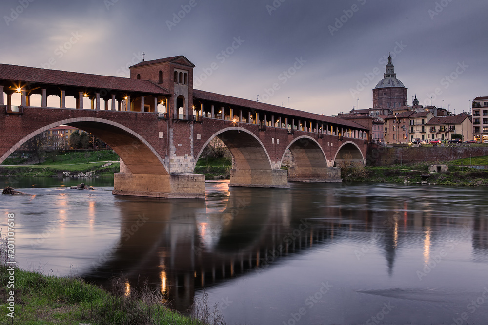 Sunset view over the Covered Bridge in Pavia