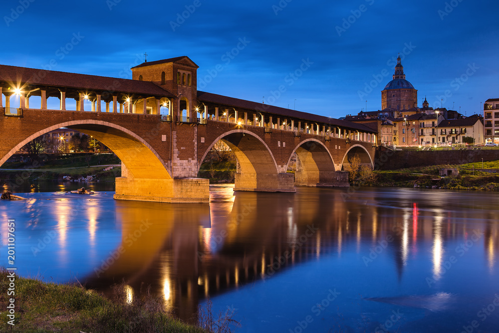 Sunset view over the Covered Bridge in Pavia