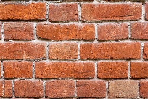 Texture of old brick building masonry using lime for background.