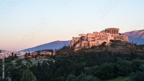 The Parthenon Temple at the Acropolis of Athens during colorful sunset, Greece © k_samurkas