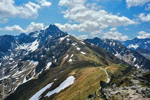 Rocky peaks and clouded sky in the Tatra Mountains in Poland.