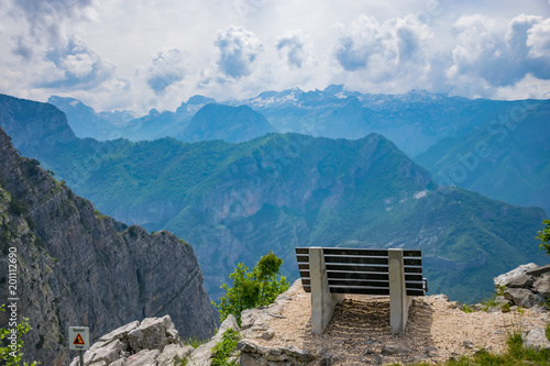 A picturesque bench for meditation is on top of a cliff.