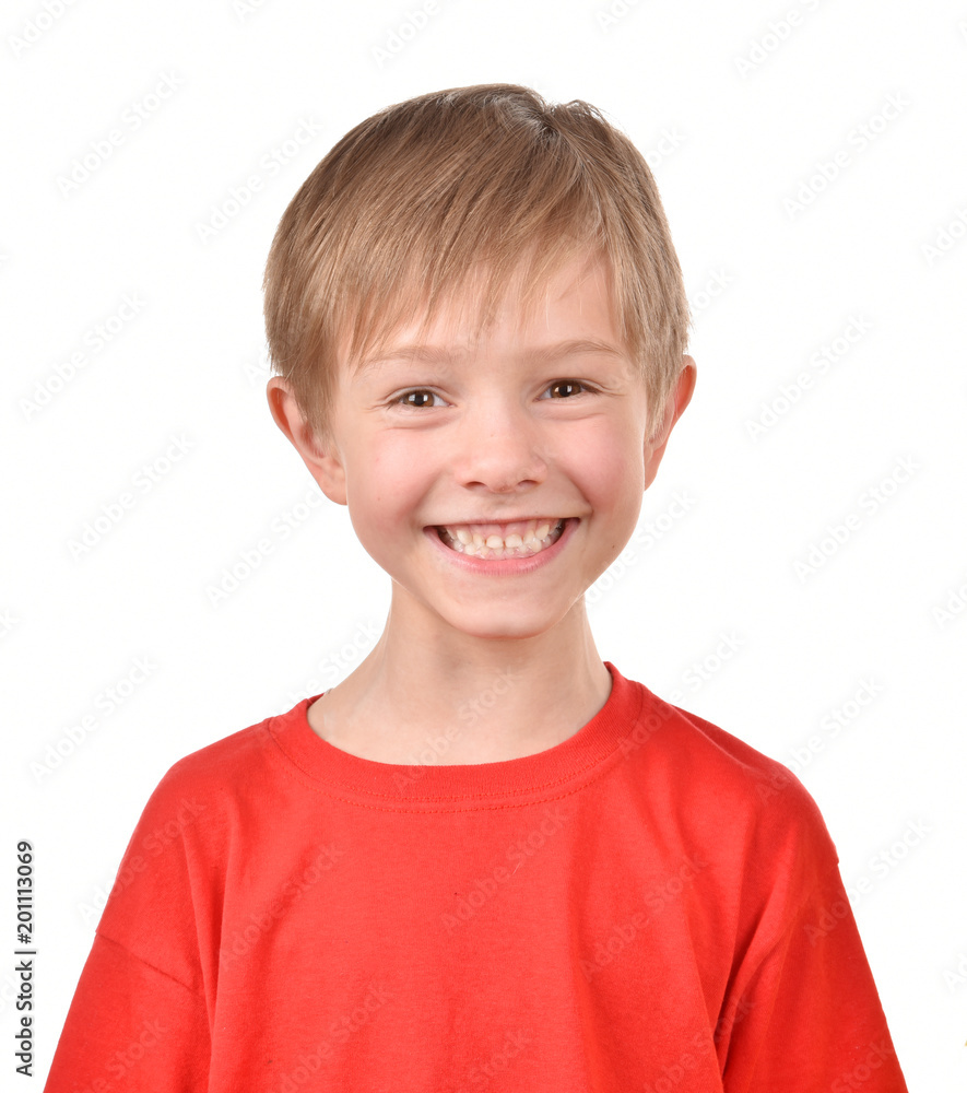 A boy is smiling on a white background. Isolated portrait of a child. A boy is smiling on a white background. Isolated portrait of a child.
