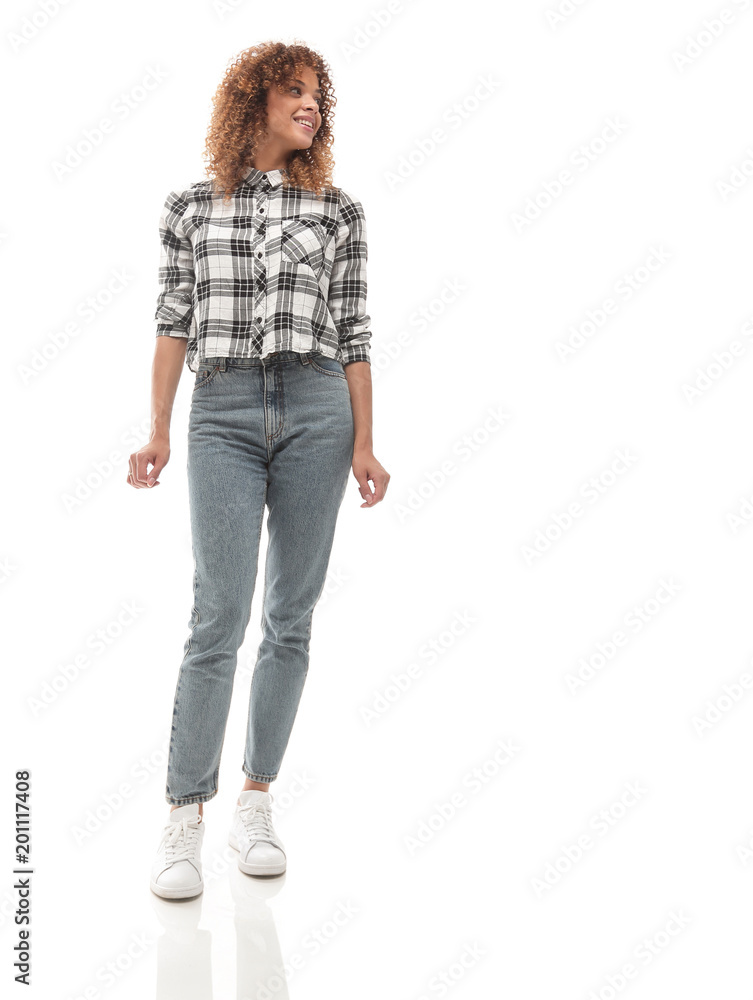 stylish young woman in plaid shirt and jeans. stylish young woman in plaid shirt and jeans.